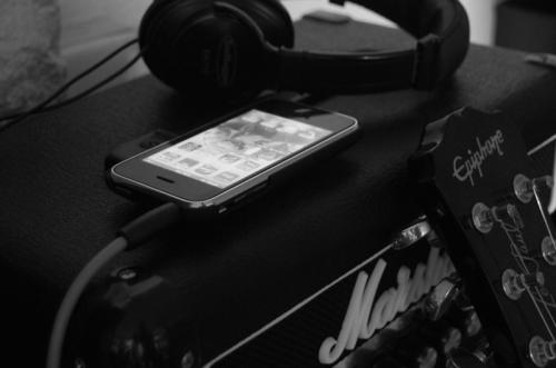 iPhone, guitar and headphones ... Ready to rock